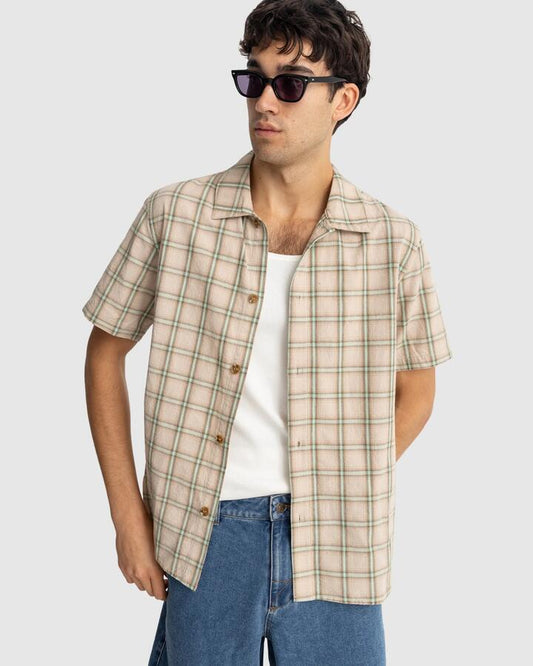 Image of a model wearing Tops. Productname: Rhythm Mens Check Short Sleeve Shirt Sand - in Sand colour by brand - Rhythm