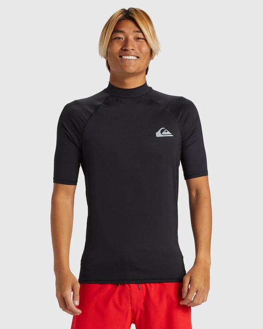 Image of a model wearing Tops. Productname: Quiksilver - Mens Everyday Short Sleeve Upf 50 Rash Vest - Black - in Black colour by brand - Quiksilver