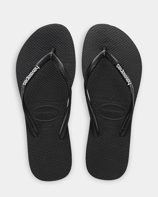 Image of Sandals. Productname: Havaianas - Womens Slim Rubber Logo Thongs - Preto/Branco - in Preto/Branco colour by brand - Havaianas