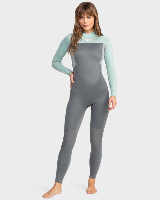 Image of a model wearing Tops. Productname: Roxy Womens 3/2Mm Prologue Flatlock Back Zip Wetsuit Ice Green - in Ice Green colour by brand - Roxy