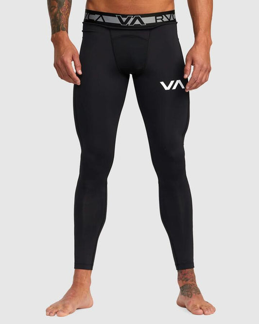 Image of a model wearing Pants. Productname: RVCA - Mens Compression Pant - Black - in Black colour by brand - RVCA
