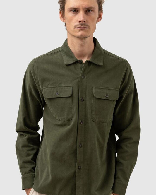 Image of a model wearing Tops. Productname: Rhythm Mens Brushed Twill Long Sleeve Shirt Olive - in Olive colour by brand - Rhythm