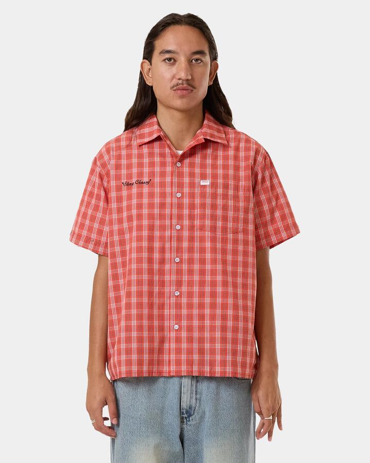 Image of a model wearing Tops. Productname: Worship - Mens All Class Short Sleeve Shirt - Cherry Tomato - in Cherry Tomato colour by brand - Worship