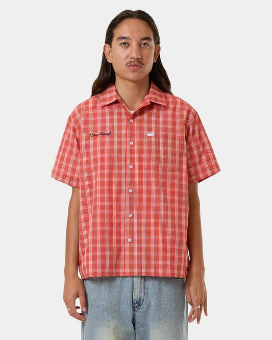 Image of a model wearing Tops. Productname: Worship - Mens All Class Short Sleeve Shirt - Cherry Tomato - in Cherry Tomato colour by brand - Worship