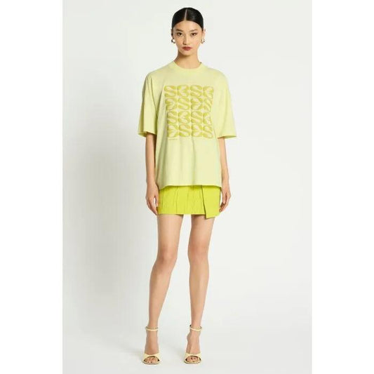 Image of a model wearing Tops. Productname: Ludovica Tee in PEAR GREEN colour by brand - sass and bide