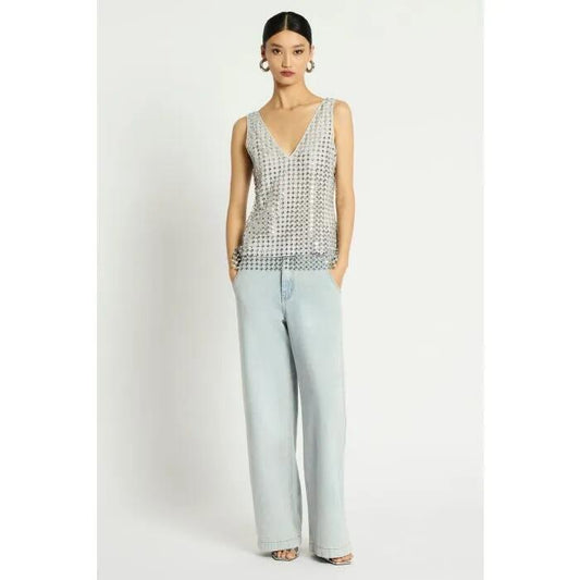 Image of a model wearing Tops. Productname: Pinnacle Lace Top in Silver colour by brand - sass and bide