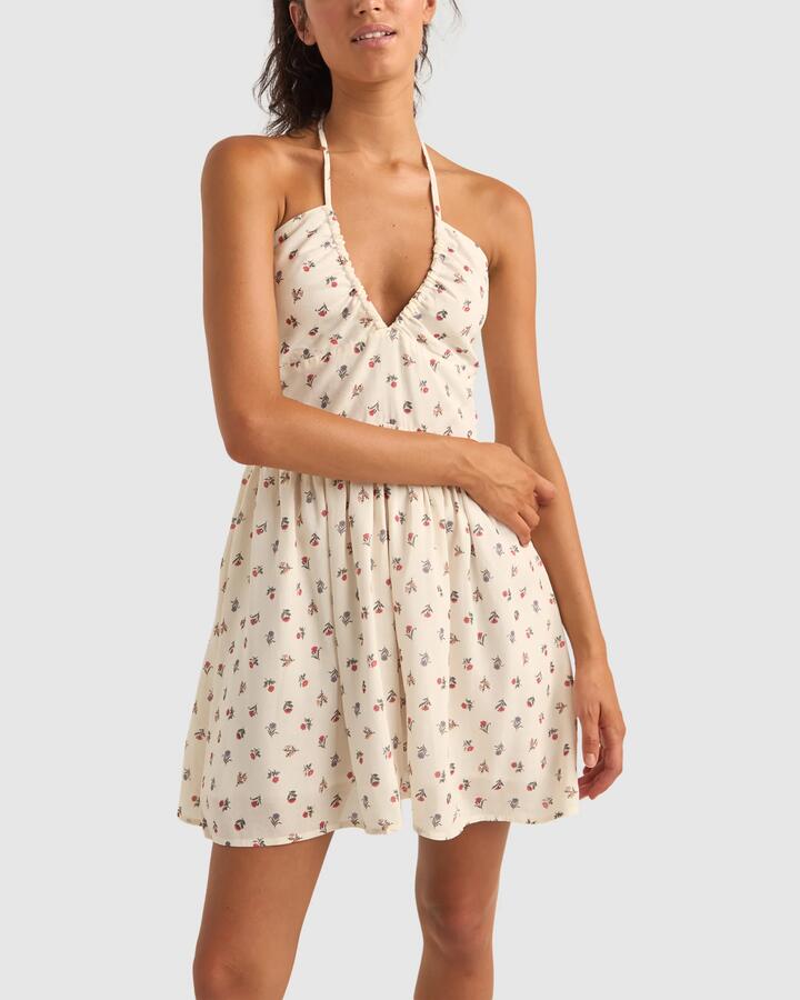 Image of a model wearing Tops. Productname: Rhythm - Womens Harper Halter Mini Dress - Red Floral - in Red Floral colour by brand - Rhythm