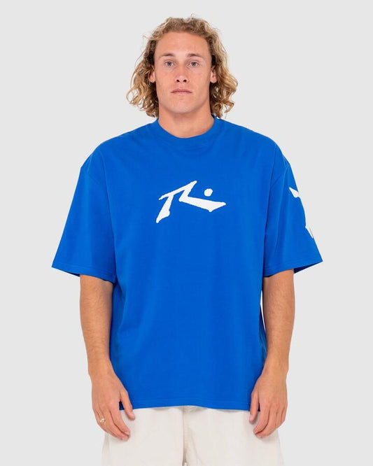 Image of a model wearing Tops. Productname: Rusty Mens Competition Revolution Short Sleeve T-Shirt Royal Blue - in Royal Blue colour by brand - Rusty