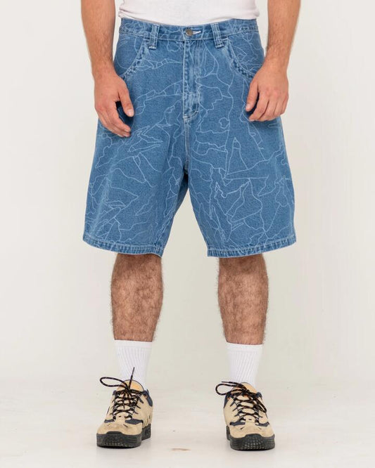 Image of a model wearing Shorts. Productname: Rusty - Mens Flip Daddy Lazer Denim Shorts - Middy Blue - in Middy Blue colour by brand - Rusty