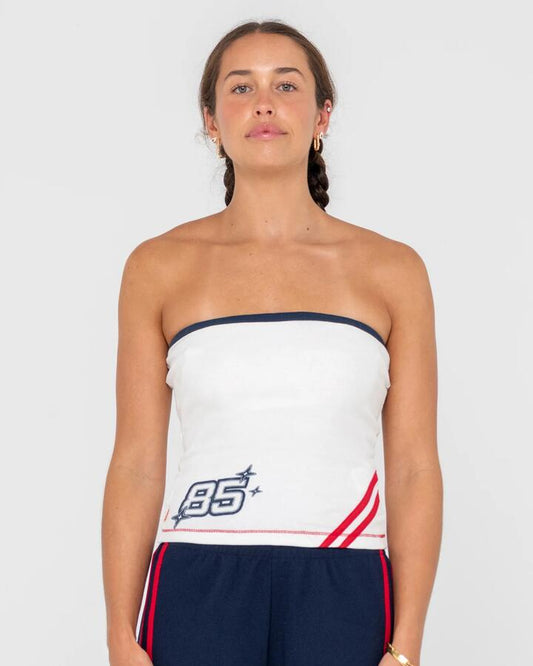 Image of a model wearing Tops. Productname: Rusty - Womens Hot Gossip R2K Tube Top - Off White - in Off White colour by brand - Rusty