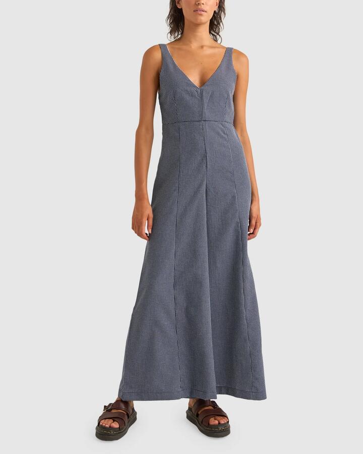 Image of a model wearing Pants. Productname: Rhythm - Womens Check Wide Leg Overalls - Navy - in Navy colour by brand - Rhythm