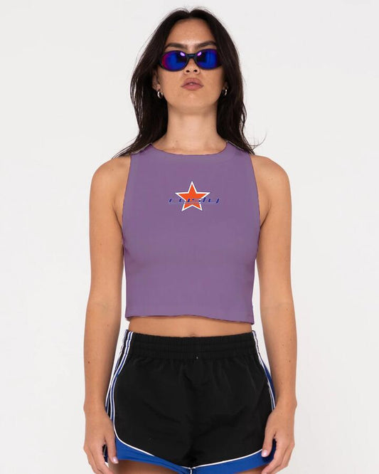 Image of a model wearing Tops. Productname: Rusty - Womens Starry Eyed Skimmer Tank Top - Purple Nights - in Purple Nights colour by brand - Rusty