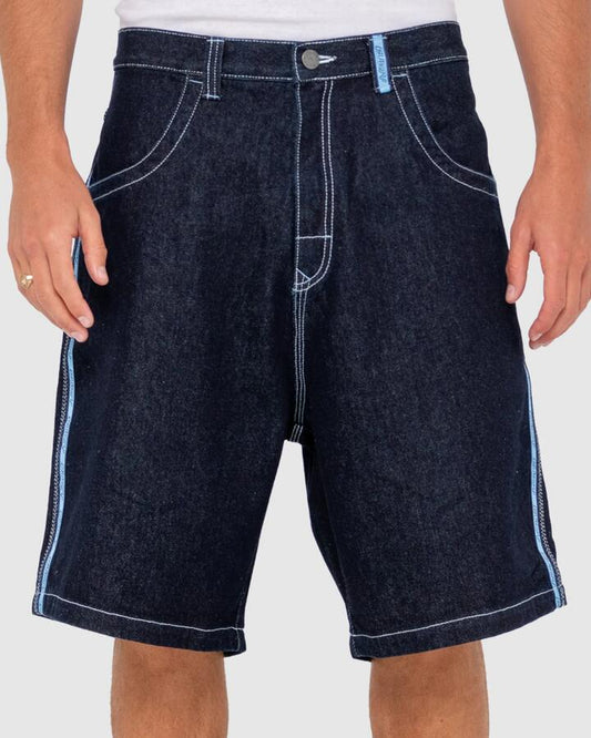 Image of a model wearing Shorts. Productname: Rusty - Mens Flip Daddy 2.0 Denim Shorts - Raw Dawg Blue - in Raw Dawg Blue colour by brand - Rusty