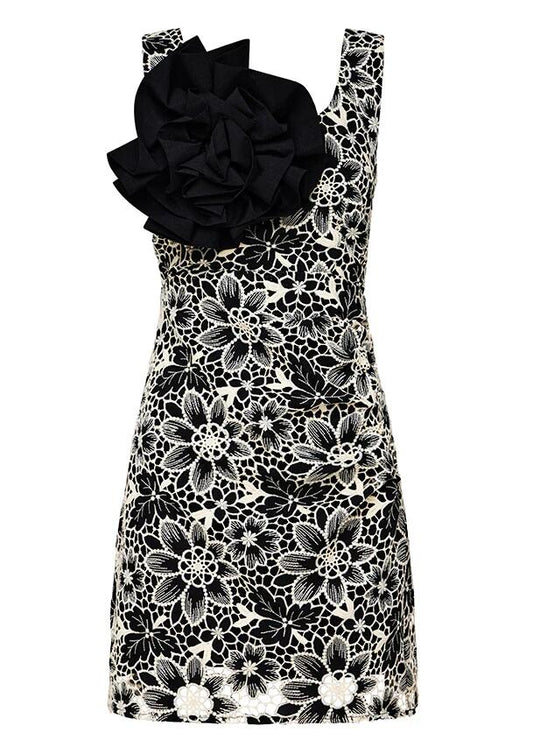 Image of a model wearing Dress. Productname: Amelia Embroidery Mini Dress in Black colour by brand - MOS The Label