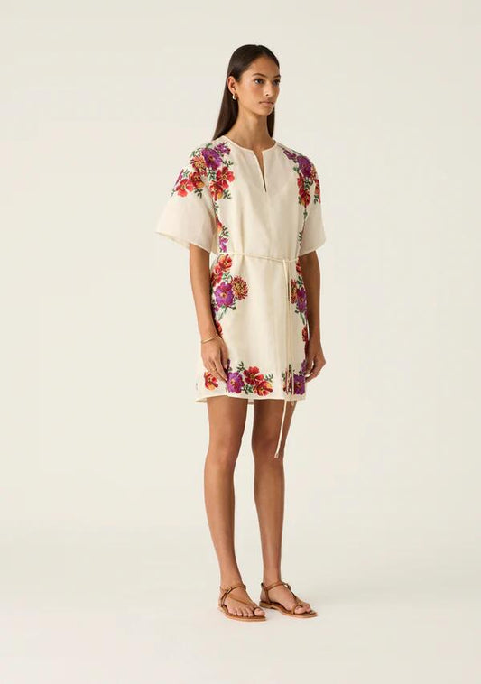 Image of a model wearing Dress. Productname: Frida Embroidery Mini Dress in Ivory colour by brand - MOS The Label