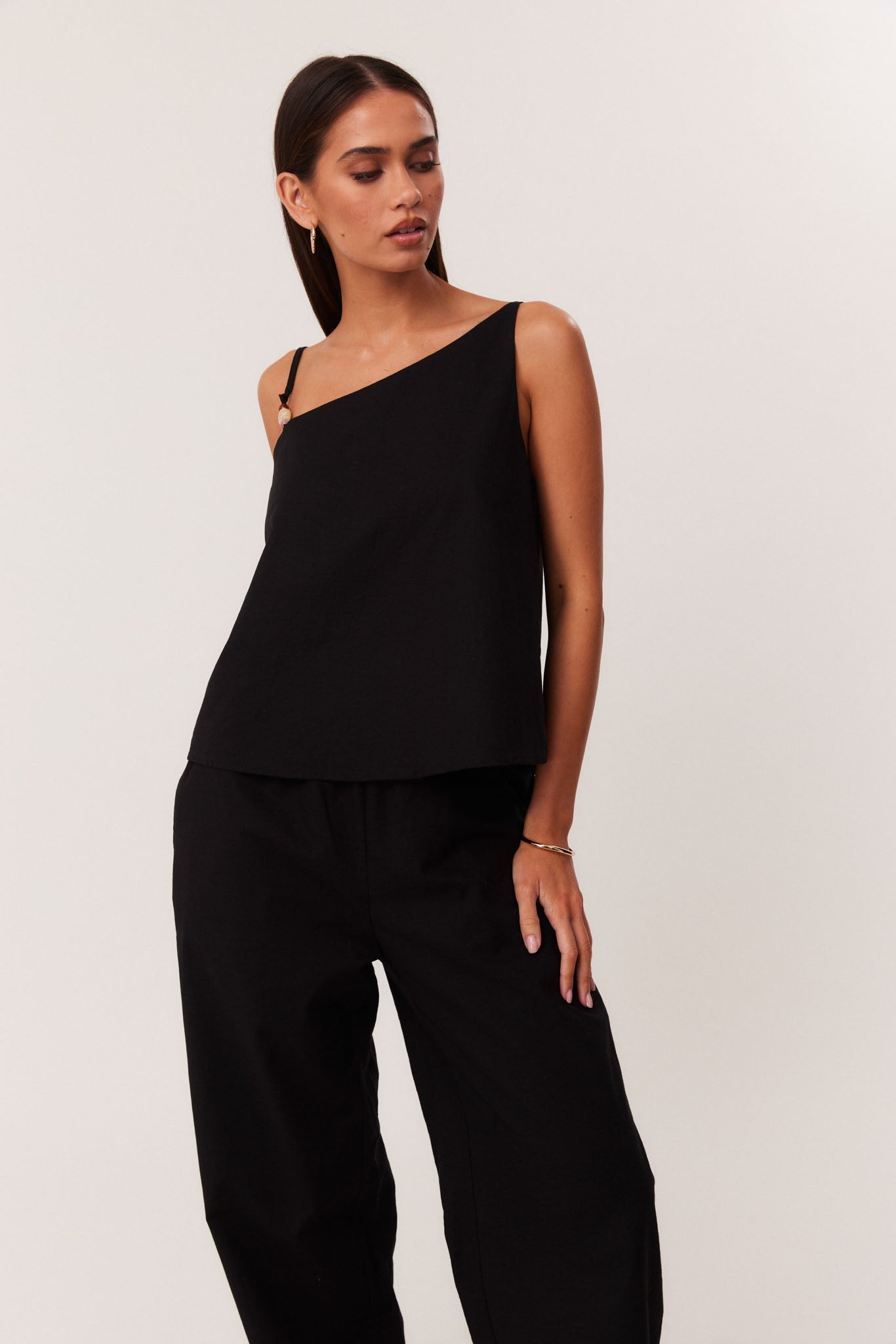 Image of a model wearing Tops. Productname: SNDYS ISMENE TOP in Black colour by brand - SNDYS