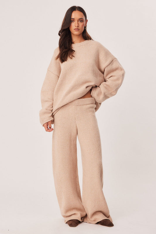 Image of a model wearing Pants. Productname: SNDYS ZIA KNIT PANTS in Beige Marl colour by brand - SNDYS