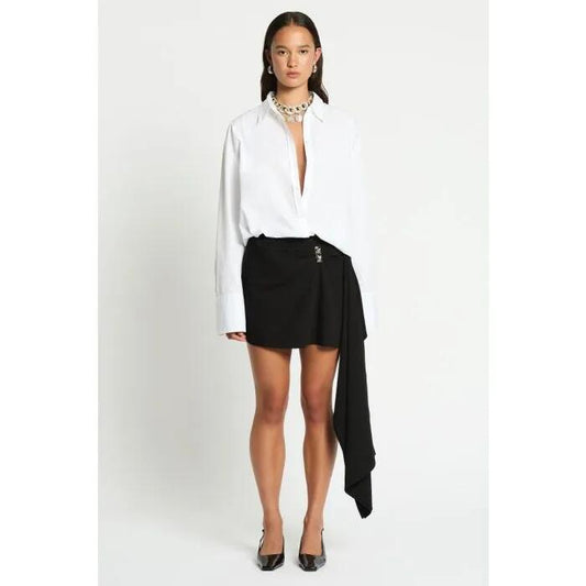 Image of a model wearing Skirts. Productname: Reine Skirt in NOIR colour by brand - sass and bide