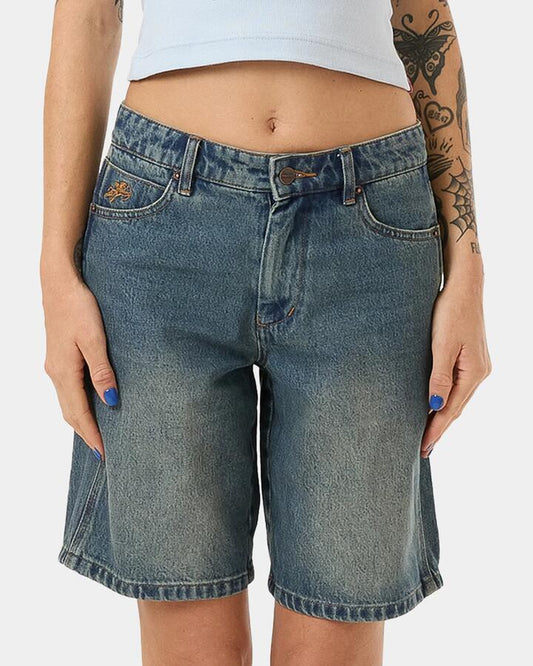 Image of a model wearing Shorts. Productname: Worship - Womens Try Again Sloucher Shorts - Dirty Mid Blue - in Dirty Mid Blue colour by brand - Worship