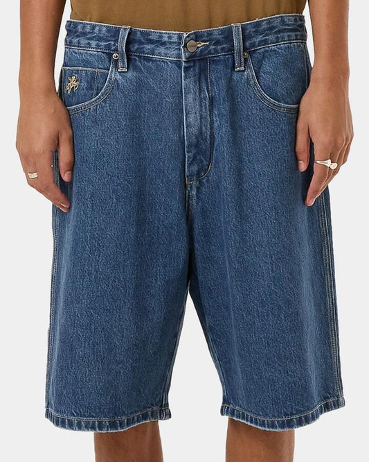Image of a model wearing Shorts. Productname: Worship - Mens Big Dawg Denim Shorts - Worn Blue Rinse - in Worn Blue Rinse colour by brand - Worship