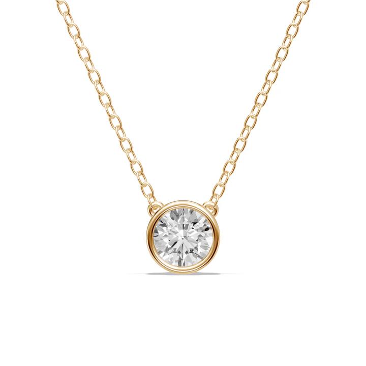 Image of Necklaces. Productname: Bezel Necklace with 0.80ct of Laboratory-Grown Diamonds in 9kt Yellow Gold in Diamond colour by brand - Bevilles