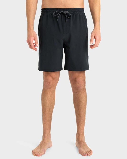 Image of a model wearing Shorts. Productname: Quiksilver - Mens Taxer Amphibian 18" Hybrid Shorts - Black - in Black colour by brand - Quiksilver