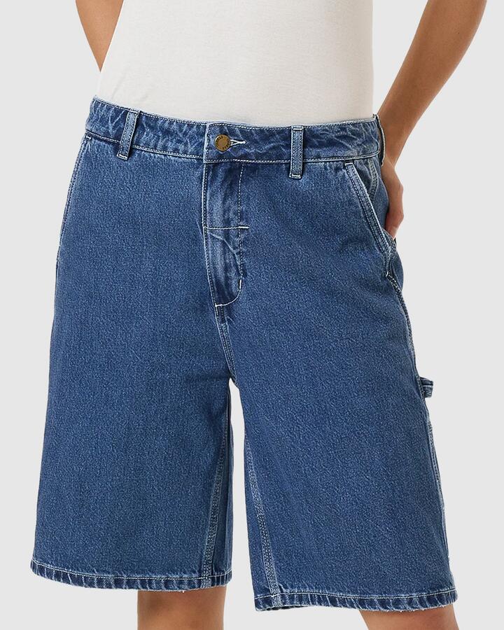Image of a model wearing Shorts. Productname: Thrills Womens Slouch Carpenter Shorts Double Rinsed Blues - in Double Rinsed Blues colour by brand - Thrills