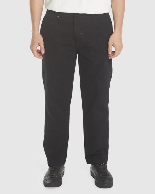 Image of a model wearing Pants. Productname: Thrills Mens Slacker Pants Black - in Black colour by brand - Thrills