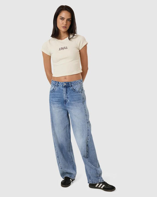 Image of a model wearing Tops. Productname: Thrills Womens Flourish Curve T-Shirt Heritage White - in Heritage White colour by brand - Thrills