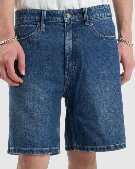 Image of a model wearing Shorts. Productname: Thrills Mens Slacker Denim Shorts Roadhouse Blue - in Roadhouse Blue colour by brand - Thrills