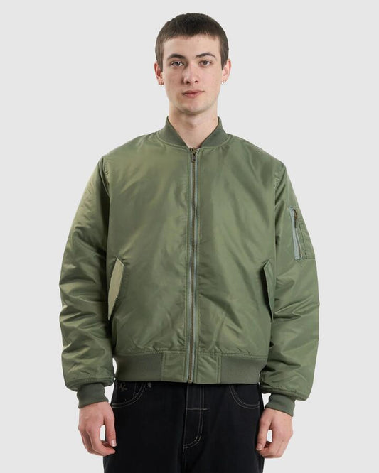 Image of a model wearing Outerwear. Productname: Thrills Mens Thrills Union Bomber Jacket Mild Army - in Mild Army colour by brand - Thrills
