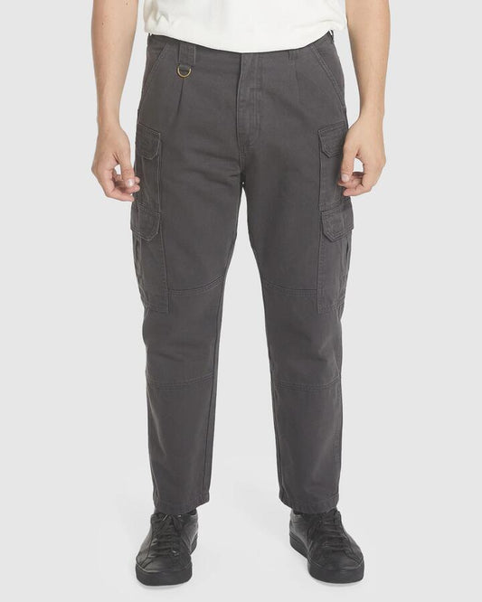 Image of a model wearing Pants. Productname: Thrills Mens Slacker Union Utility Pants Dark Charcoal - in Dark Charcoal colour by brand - Thrills
