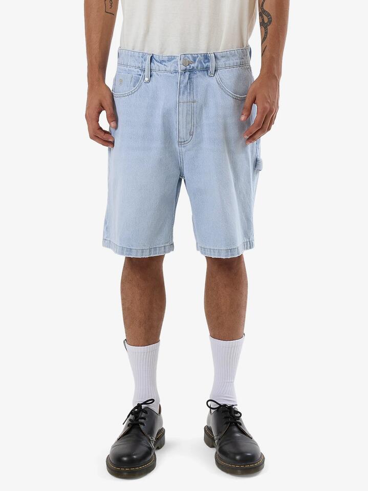 Image of a model wearing Shorts. Productname: Thrills Mens Slacker Denim Shorts Light Ash Blue - in Light Ash Blue colour by brand - Thrills