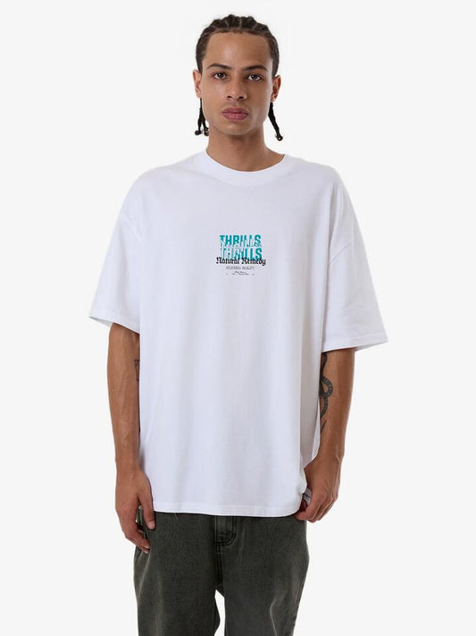 Image of a model wearing Tops. Productname: Thrills Mens Natural Remedy Box Fit Oversized T-Shirt White - in White colour by brand - Thrills
