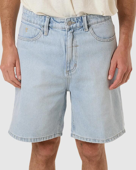 Image of a model wearing Shorts. Productname: Thrills Mens Slacker Denim Shorts Ether Blue - in Ether Blue colour by brand - Thrills