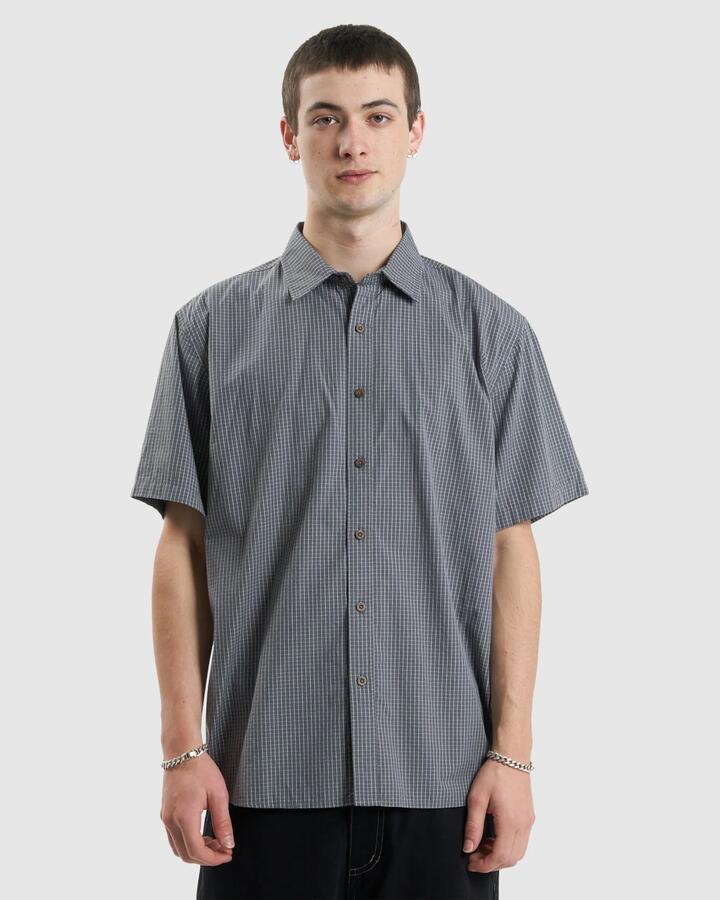 Image of a model wearing Tops. Productname: Thrills Mens Cortex Short Sleeve Shirt Army Blue - in Army Blue colour by brand - Thrills