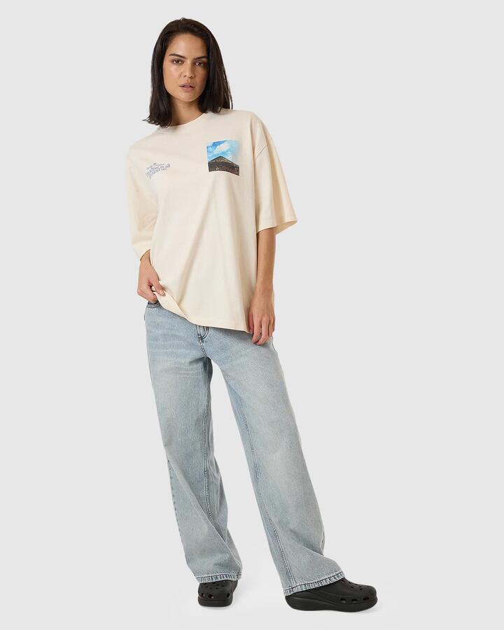 Image of a model wearing Tops. Productname: Thrills Womens Integration Oversized T-Shirt Heritage White - in Heritage White colour by brand - Thrills