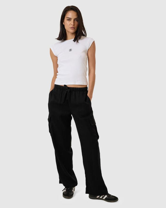 Image of a model wearing Pants. Productname: Thrills Womens Ember Pocket Pant Black - in Black colour by brand - Thrills