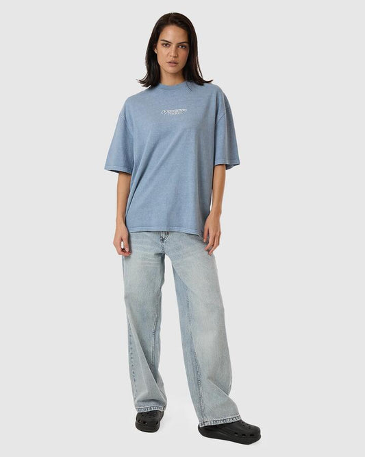 Image of a model wearing Tops. Productname: Thrills Womens Meditation Practice Oversized T-Shirt Dusty Blue - in Dusty Blue colour by brand - Thrills