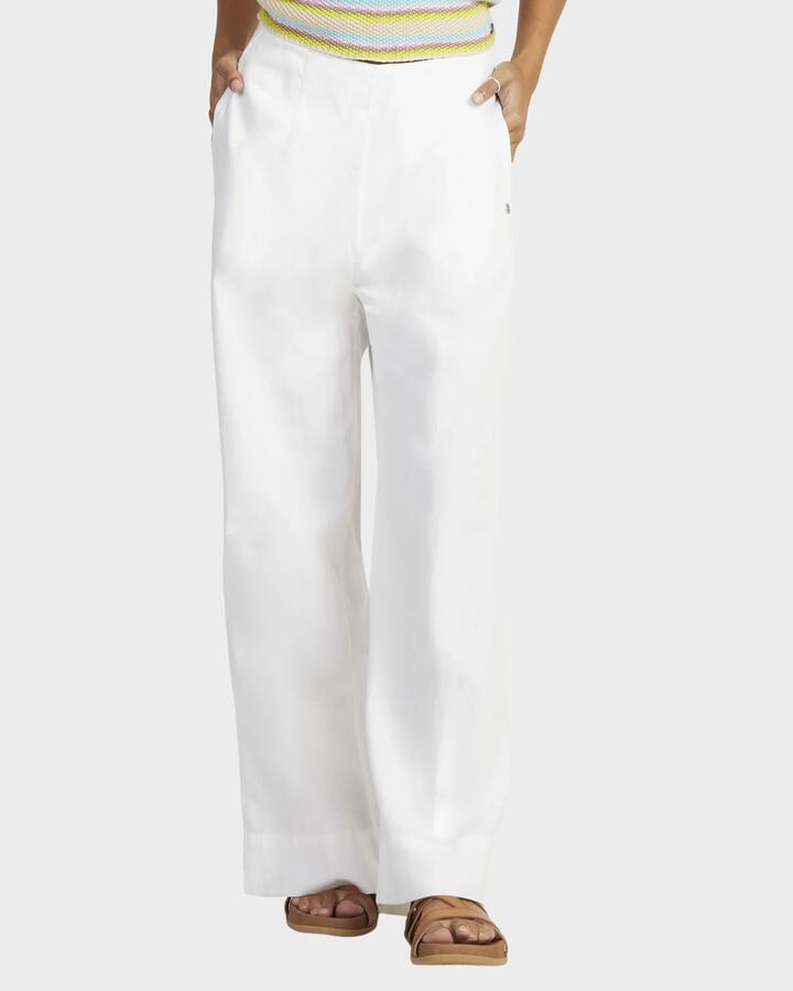 Image of a model wearing Pants. Product name - Roxy Womens Santorini Palazzo Pants Bright White in Bright White colour by brand - Roxy