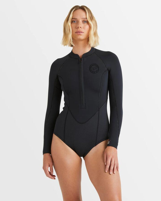 Image of a model wearing Tops. Productname: Billabong Womens 2/2Mm Salty Dayz Natural Long Sleeve Springsuit Black - in Black colour by brand - Billabong