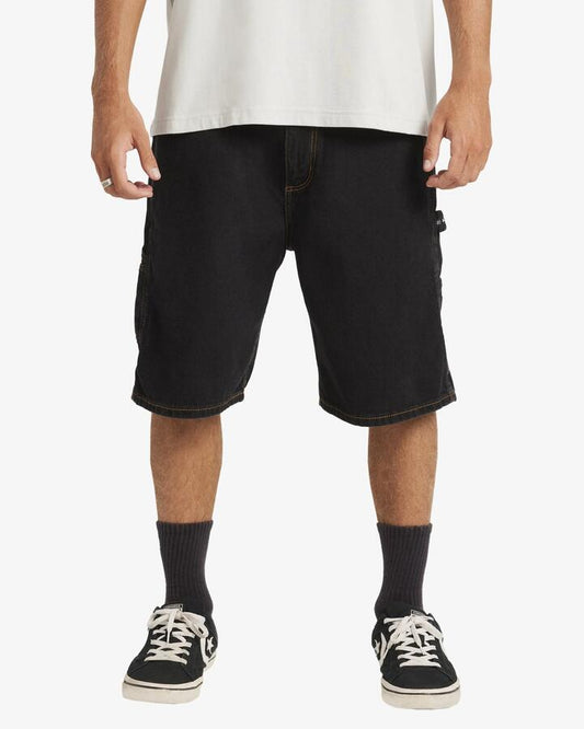 Image of a model wearing Shorts. Productname: Billabong Mens Bad Dog Workwear Denim Shorts Washed Black - in Washed Black colour by brand - Billabong