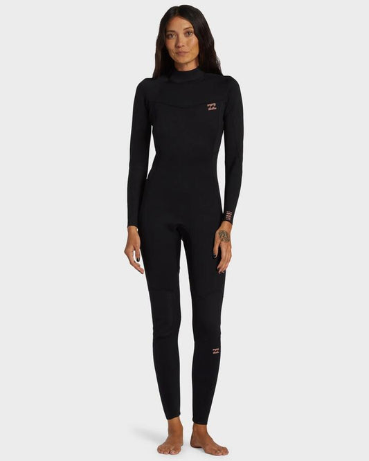 Image of a model wearing Tops. Productname: Billabong - Womens 4/3Mm Foil Gbs Back Zip Wetsuit - Black - in Black colour by brand - Billabong