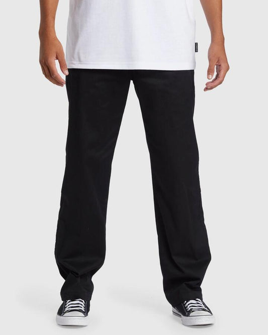 Image of a model wearing Pants. Productname: Quiksilver - Mens Union Regular Chino Pants - Black - in Black colour by brand - Quiksilver