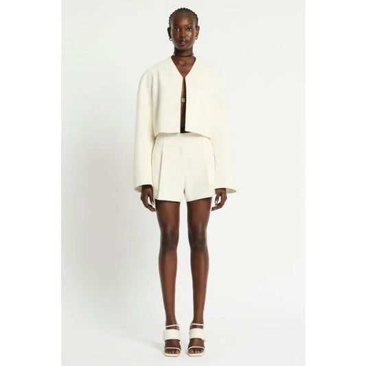 Image of a model wearing Outerwear. Productname: Satori Jacket in Ivory colour by brand - sass and bide