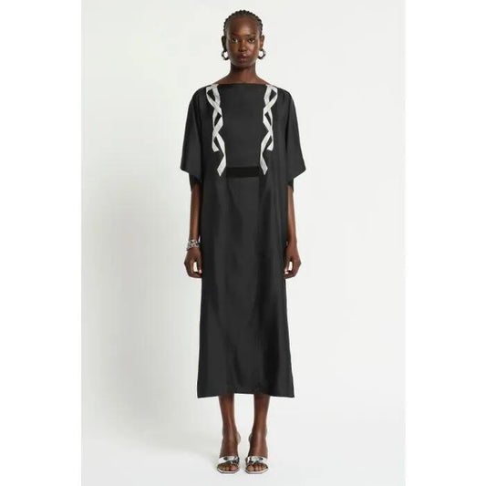 Image of a model wearing Dress. Productname: Revue Silk Dress in JET BLACK colour by brand - sass and bide