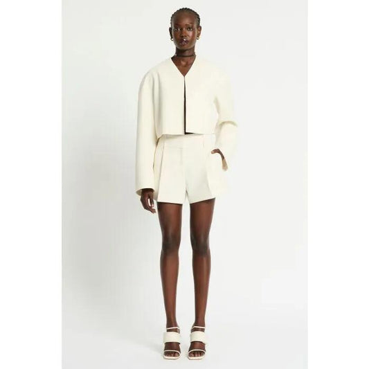 Image of a model wearing Shorts. Productname: Satori Short in Ivory colour by brand - sass and bide