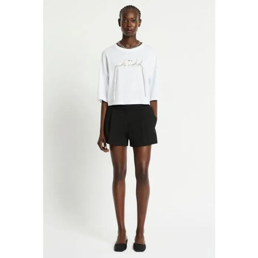 Image of a model wearing Tops. Productname: Canto Crop Tee in BRIGHT WHITE colour by brand - sass and bide