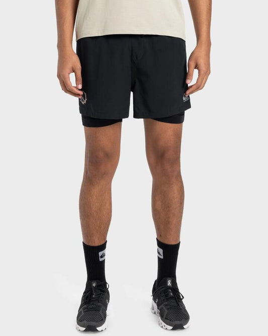 Image of a model wearing Shorts. Productname: Quiksilver - Mens Keep The Pace 14" Training Hybrid Shorts - Black - in Black colour by brand - Quiksilver
