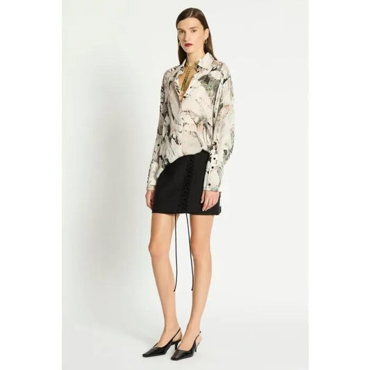 Image of a model wearing Skirts. Productname: Solene Skirt in Black colour by brand - sass and bide